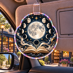 Moonlit Chapters Holographic Car Visor Clip with printed optical 3D artwork in its use setting