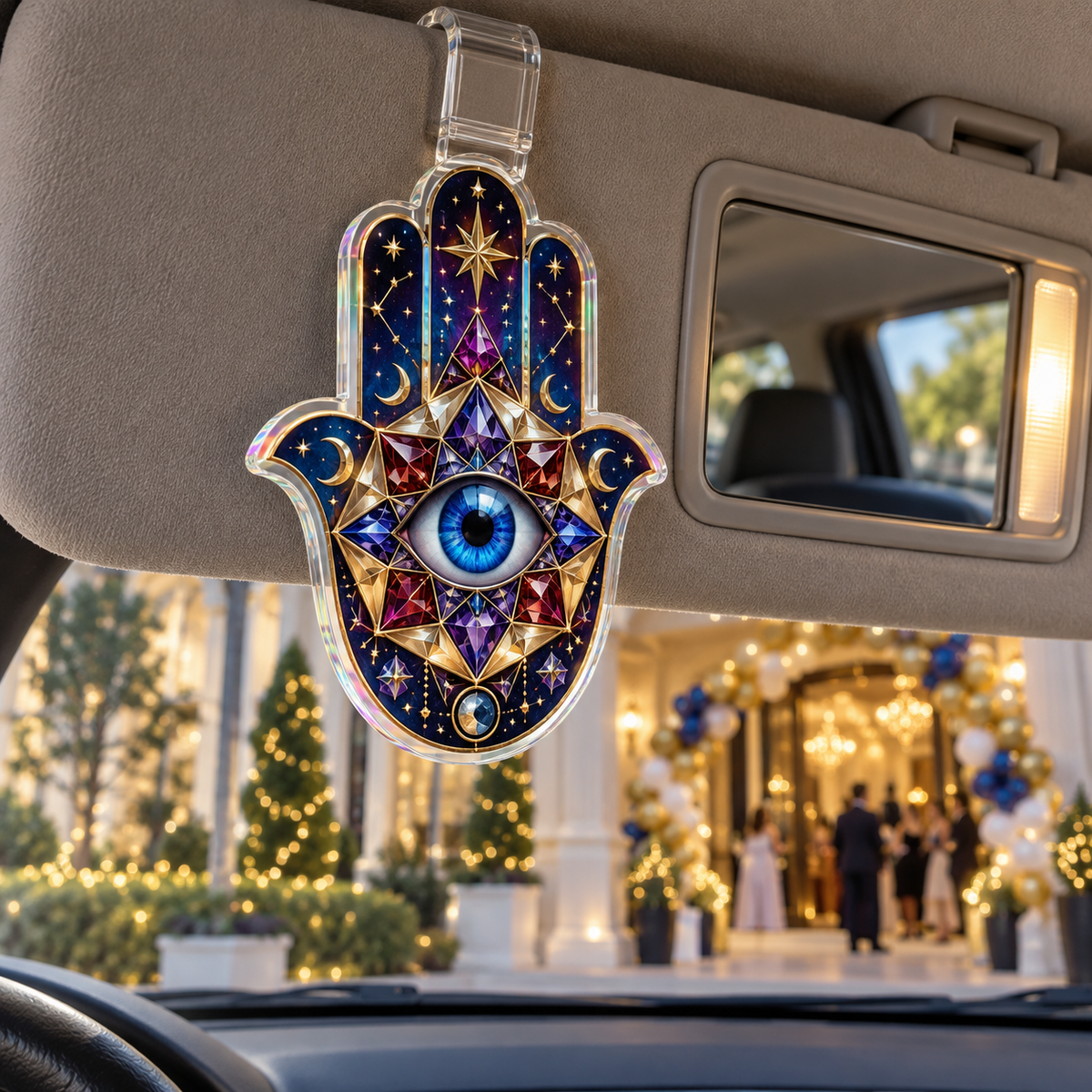 Hamsa Celestial Keepsake Holographic Car Visor Clip with printed optical 3D artwork in its use setting