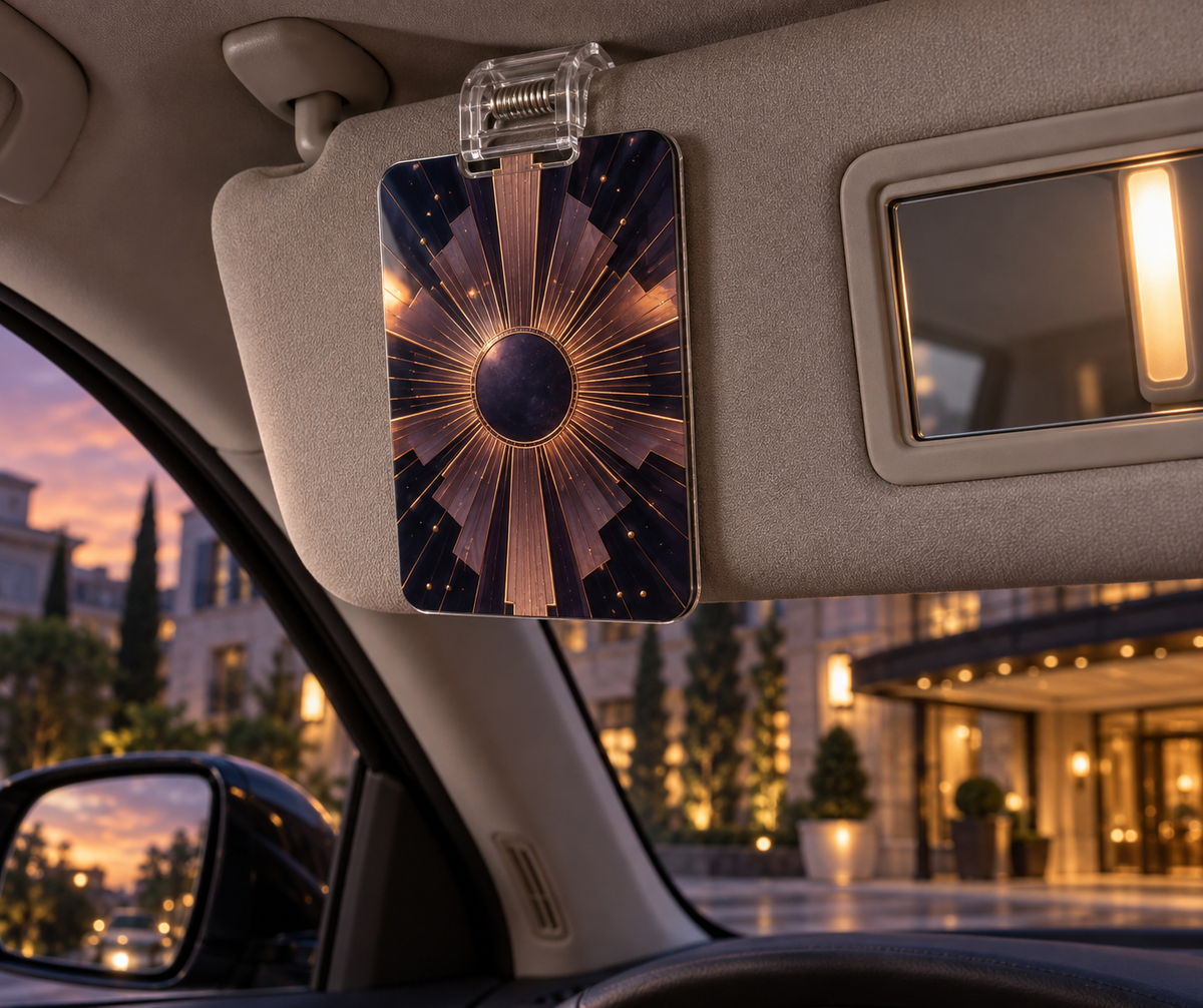 Sunburst Deco Nocturne Holographic Car Visor Clip with printed optical 3D artwork in its use setting