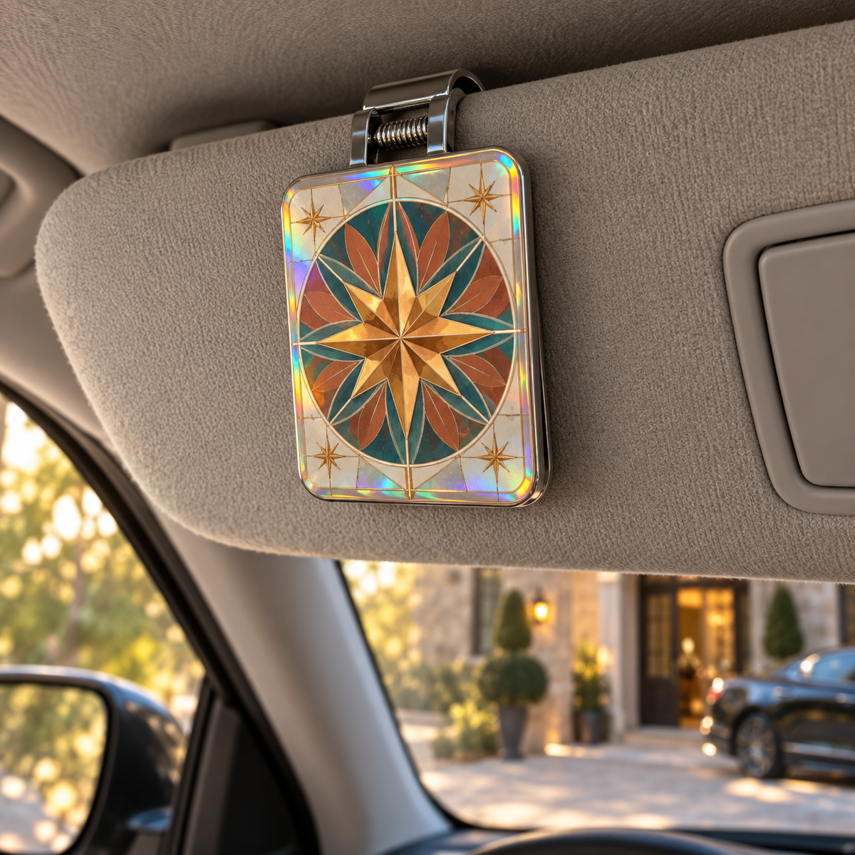 Sunburst Host Gratitude Holographic Car Visor Clip with printed optical 3D artwork in its use setting