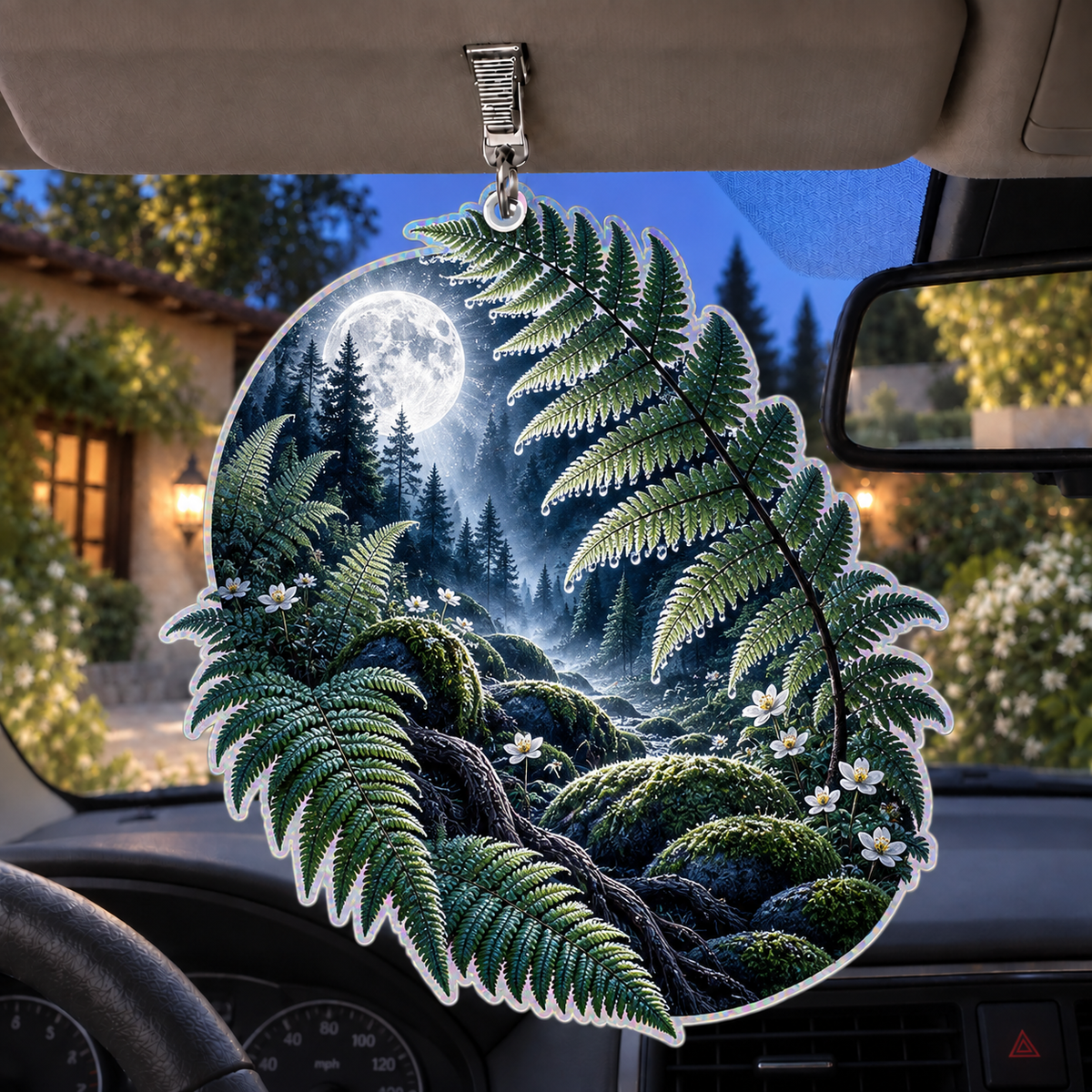Silver Fern Moon Sanctuary Holographic Car Visor Clip with printed optical 3D artwork in its use setting