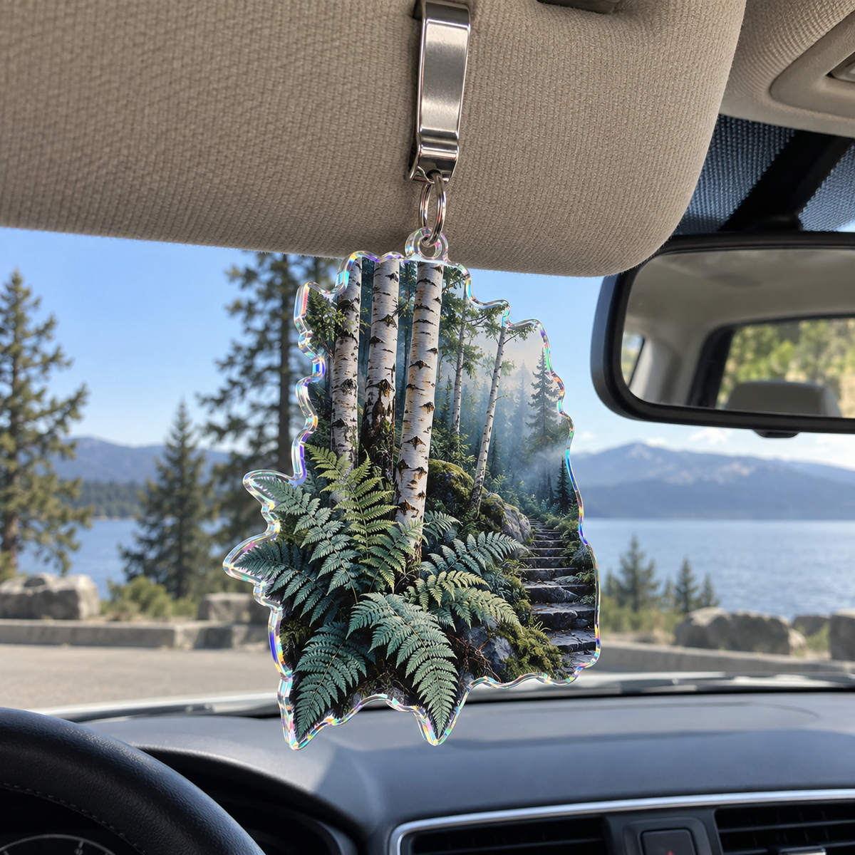 Silver Fern Triptych Passage Holographic Car Visor Clip with printed optical 3D artwork in its use setting