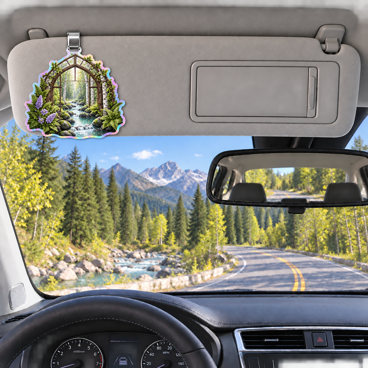 Tanglewood Curio Brook Holographic Car Visor Clip with printed optical 3D artwork in its use setting