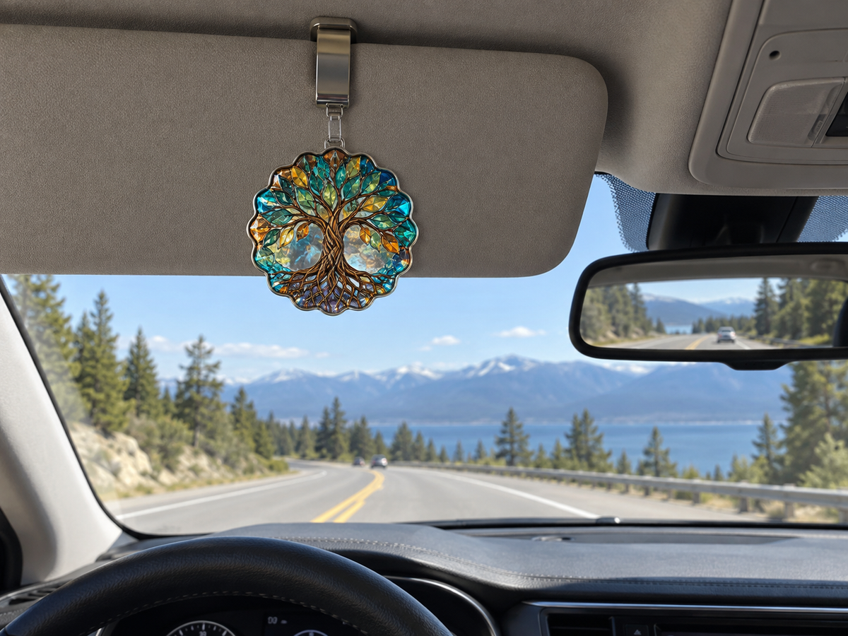 Gilded Root Gallery Holographic Car Visor Clip with printed optical 3D artwork in its use setting