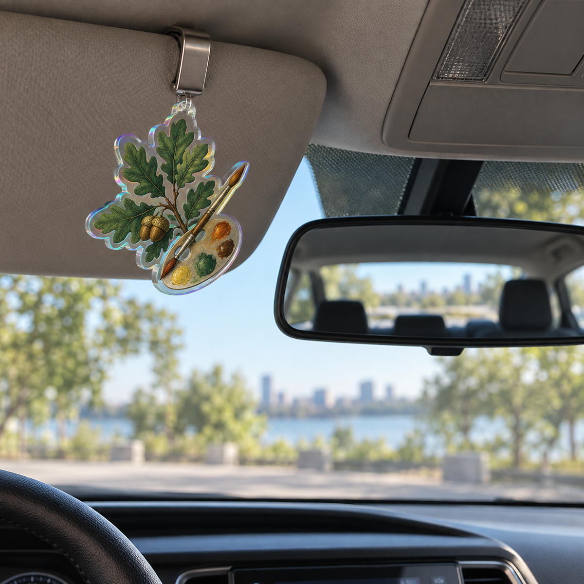 Acorn Atelier Maker Studio Holographic Car Visor Clip with printed optical 3D artwork in its use setting