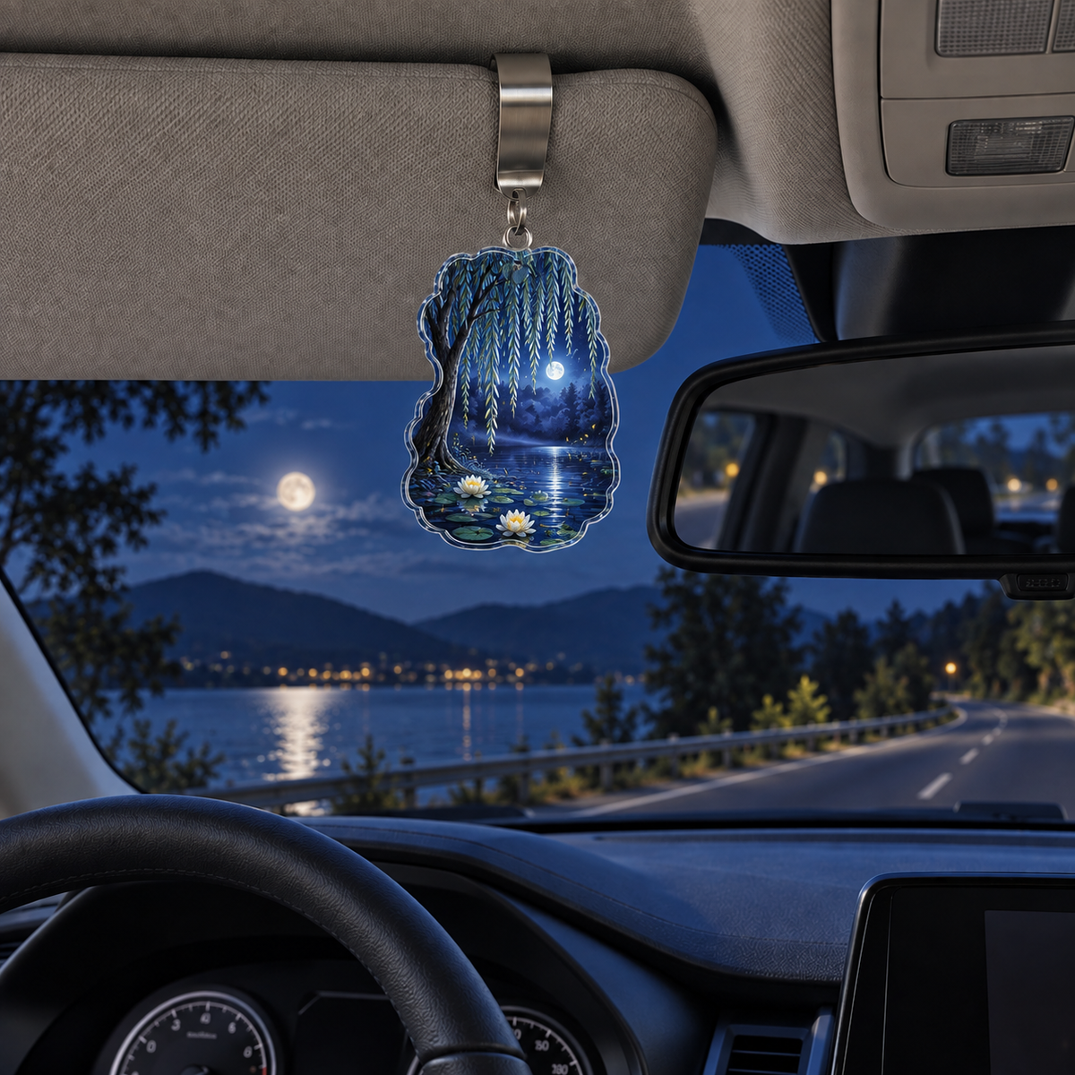 Blue Hour Willow Pond Holographic Car Visor Clip with printed optical 3D artwork in its use setting