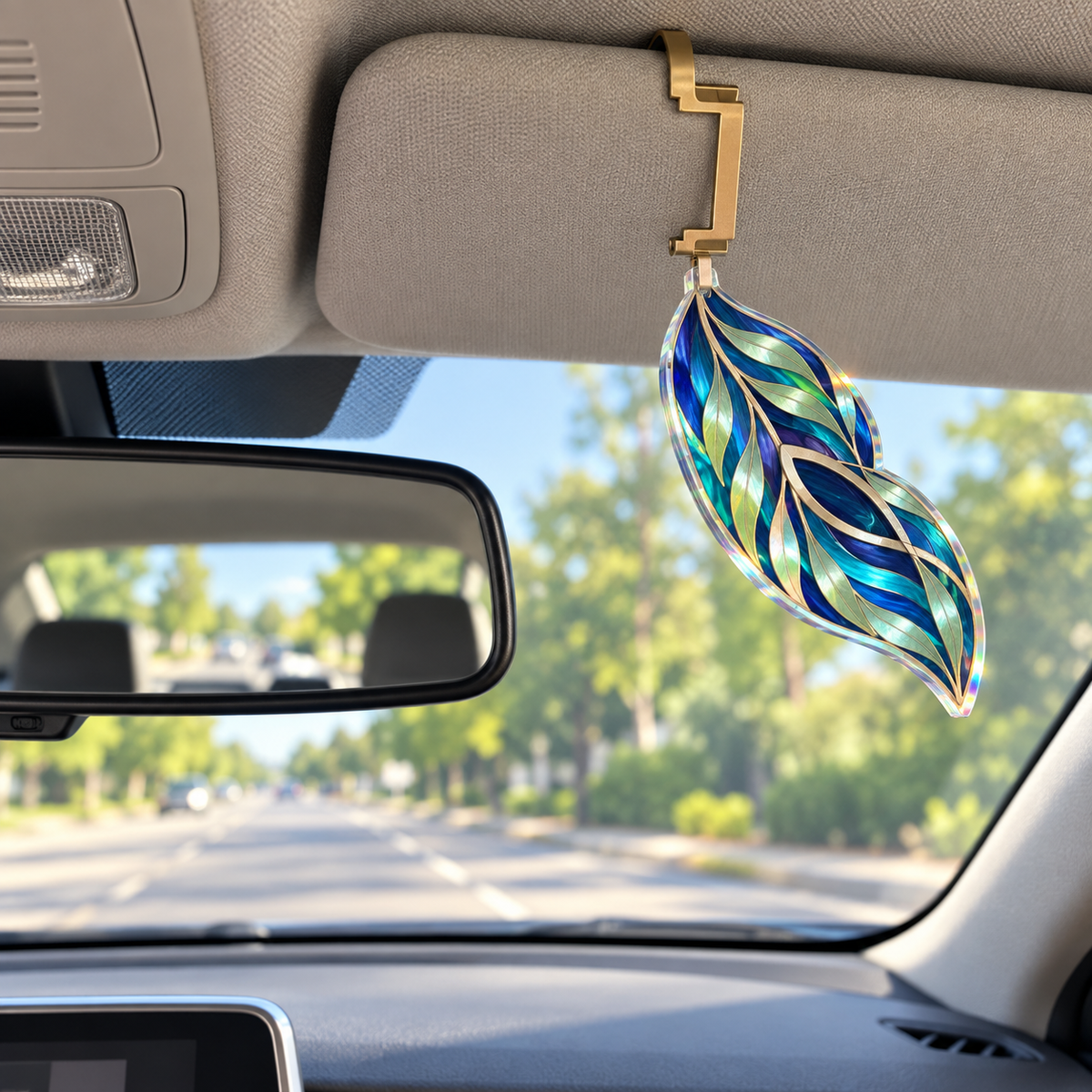 Willow Loomlight Studio Holographic Car Visor Clip with printed optical 3D artwork in its use setting