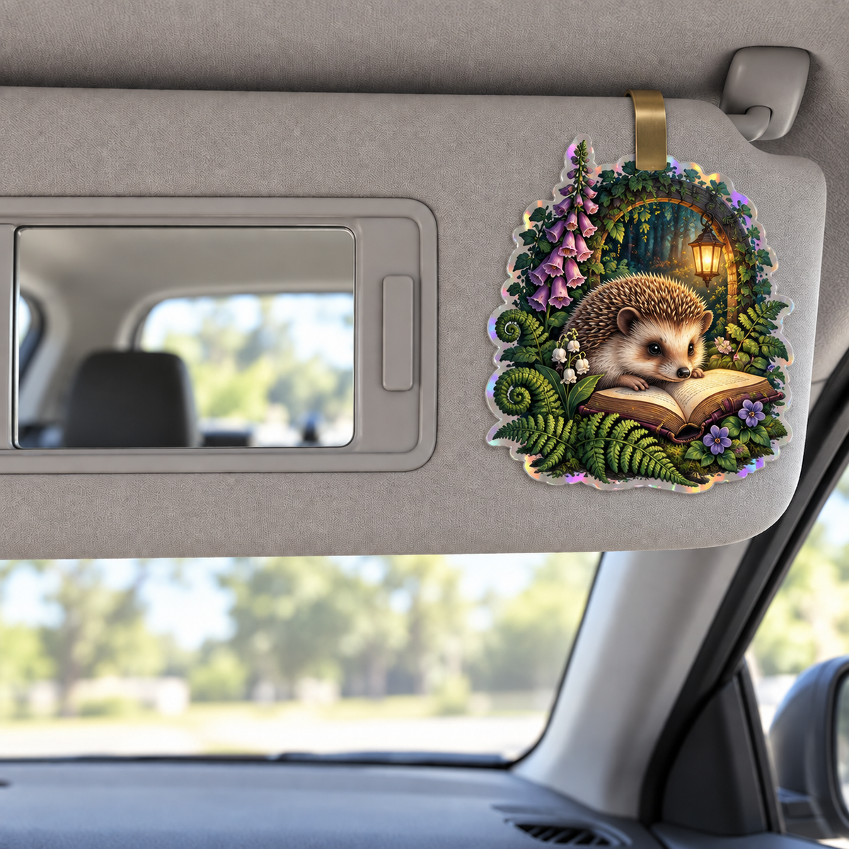 Hedgegrove Story Garden Holographic Car Visor Clip with printed optical 3D artwork in its use setting