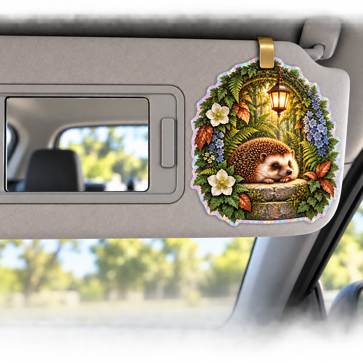 Hedgegrove Lantern Fern Alcove Holographic Car Visor Clip with printed optical 3D artwork in its use setting