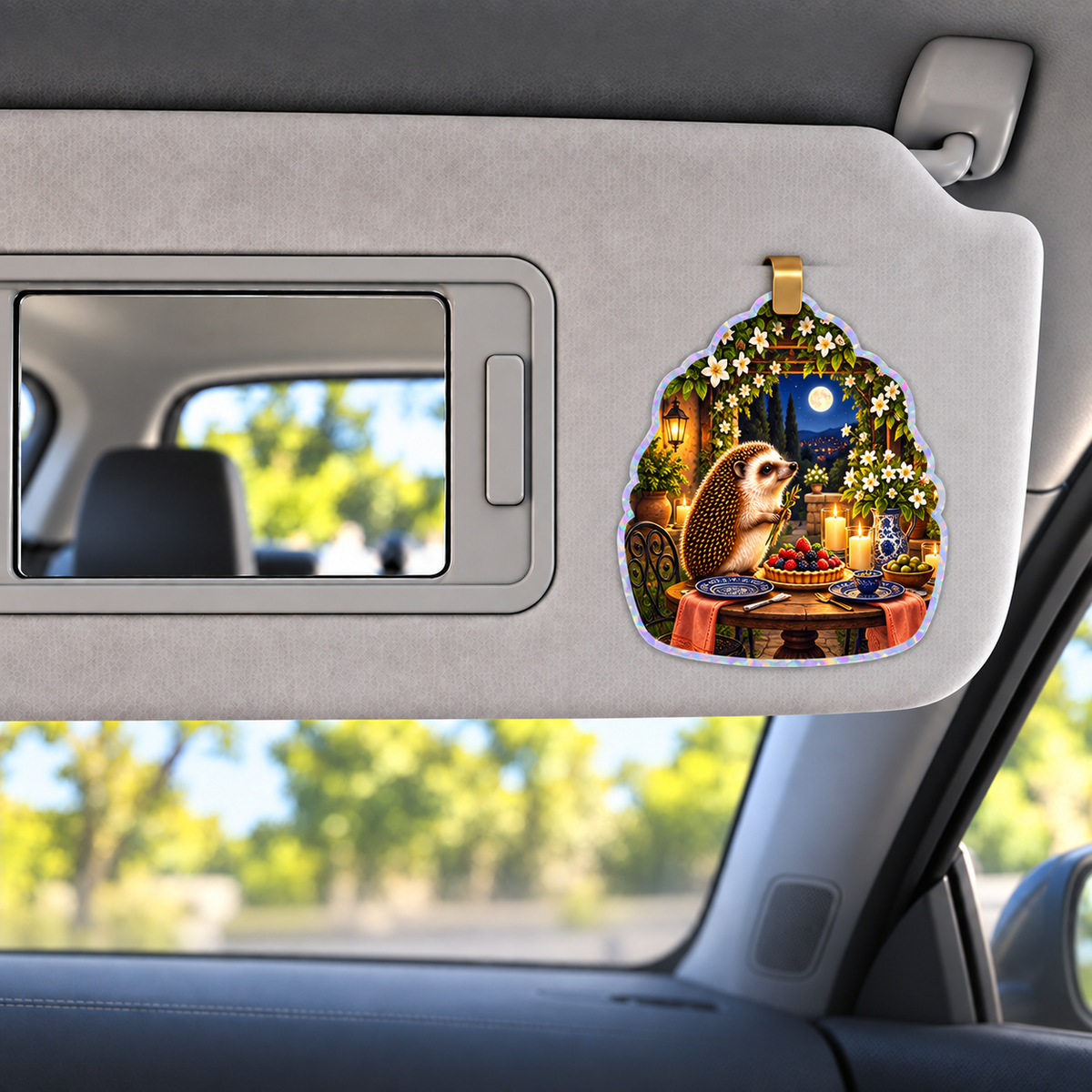 Hedgegrove Garden Welcome Holographic Car Visor Clip with printed optical 3D artwork in its use setting