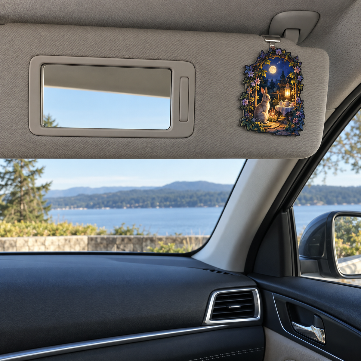 Moonlit Rabbit Supper Garden Holographic Car Visor Clip with printed optical 3D artwork in its use setting