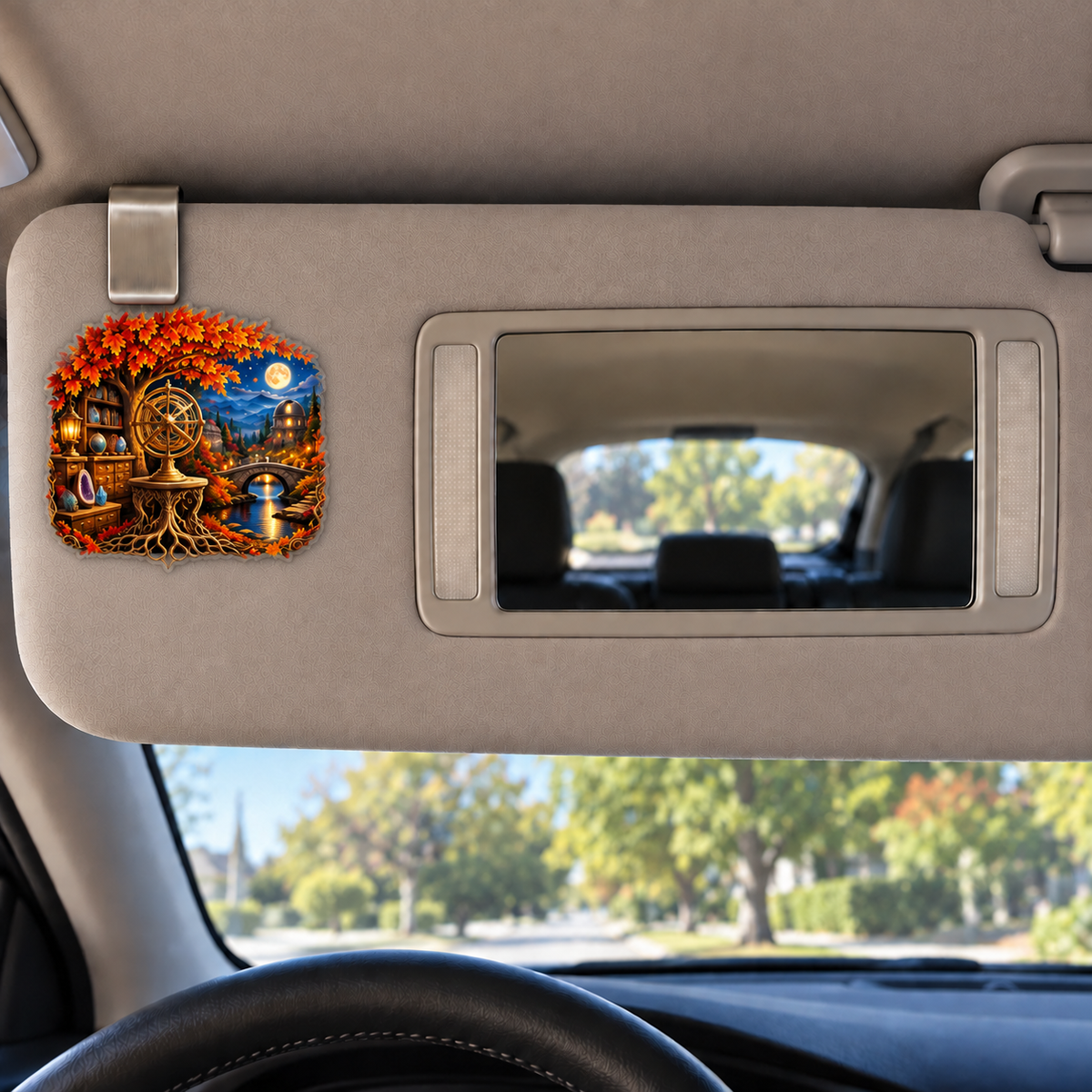 Harvest Atlas Curio Hall Holographic Car Visor Clip with printed optical 3D artwork in its use setting