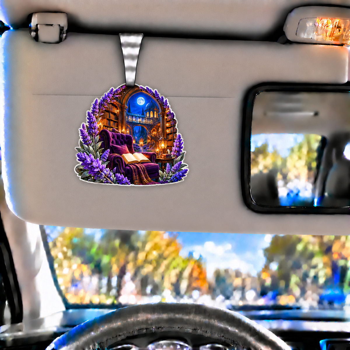 Lavender Moon Library Holographic Car Visor Clip with printed optical 3D artwork in its use setting