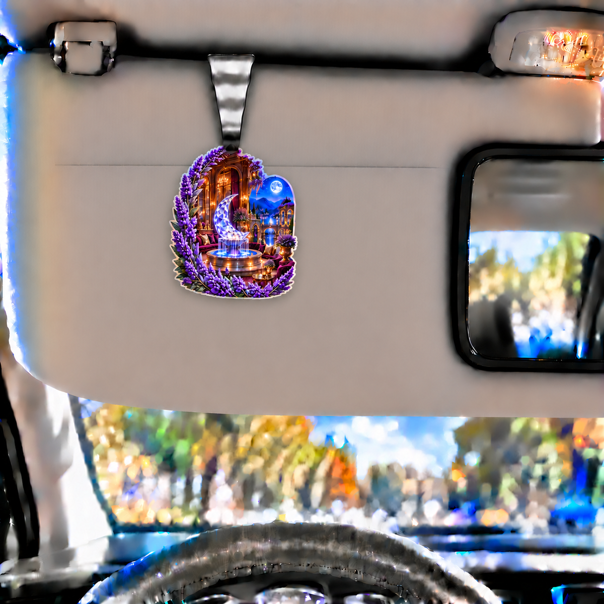 Lavender Moon Fountain Holographic Car Visor Clip with printed optical 3D artwork in its use setting