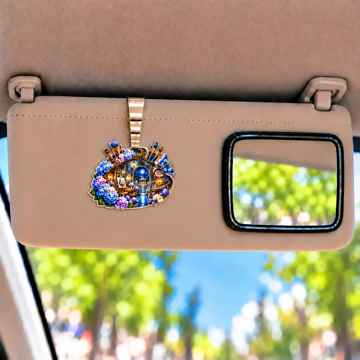 Hydrangea Atelier Portal Holographic Car Visor Clip with printed optical 3D artwork in its use setting