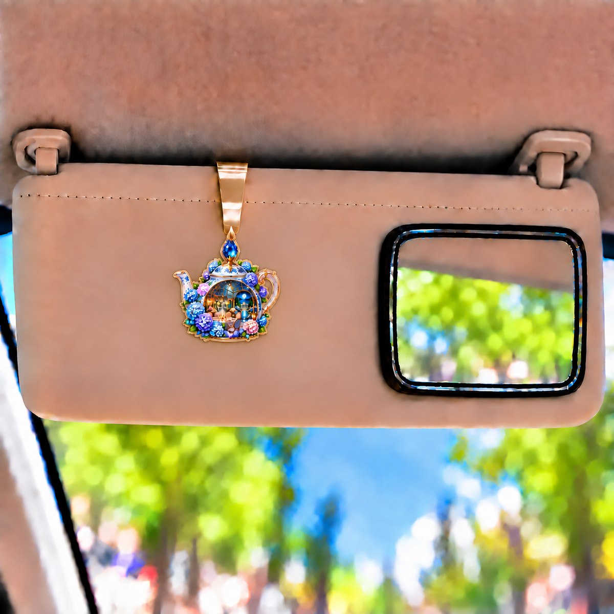 Hydrangea Moon Hospitality Holographic Car Visor Clip with printed optical 3D artwork in its use setting