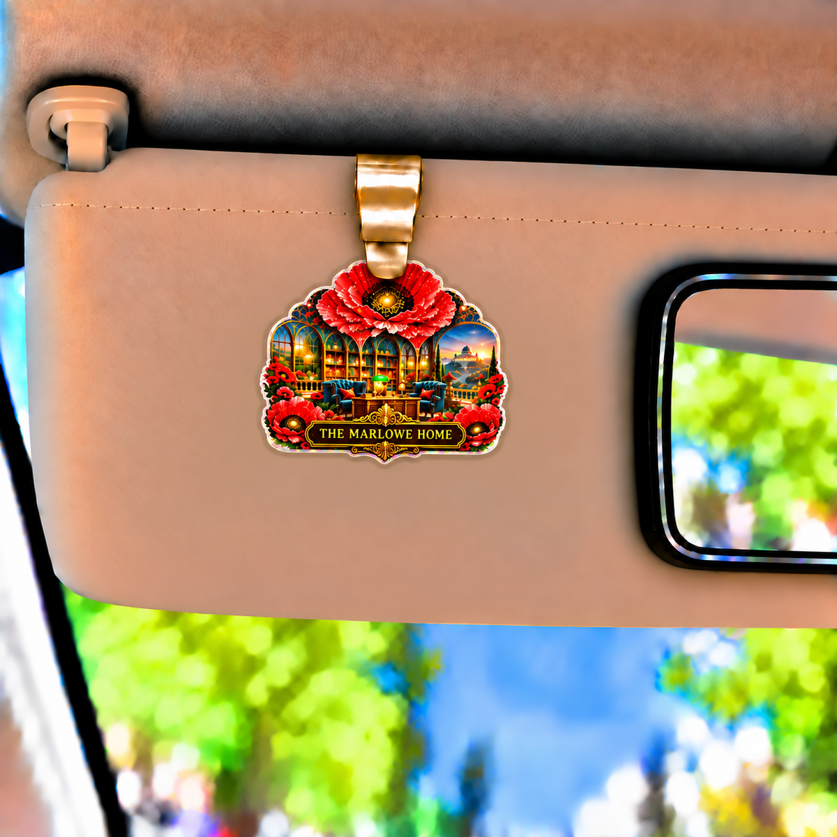 Poppy Manor Welcome Holographic Car Visor Clip with printed optical 3D artwork in its use setting