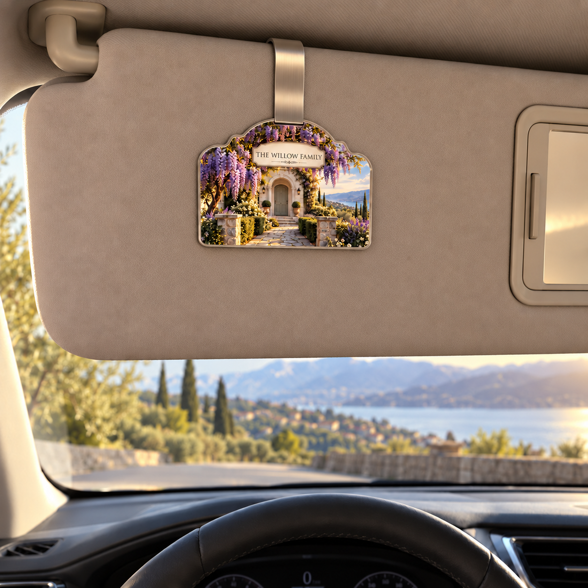 Wisteria Family Welcome Holographic Car Visor Clip with printed optical 3D artwork in its use setting