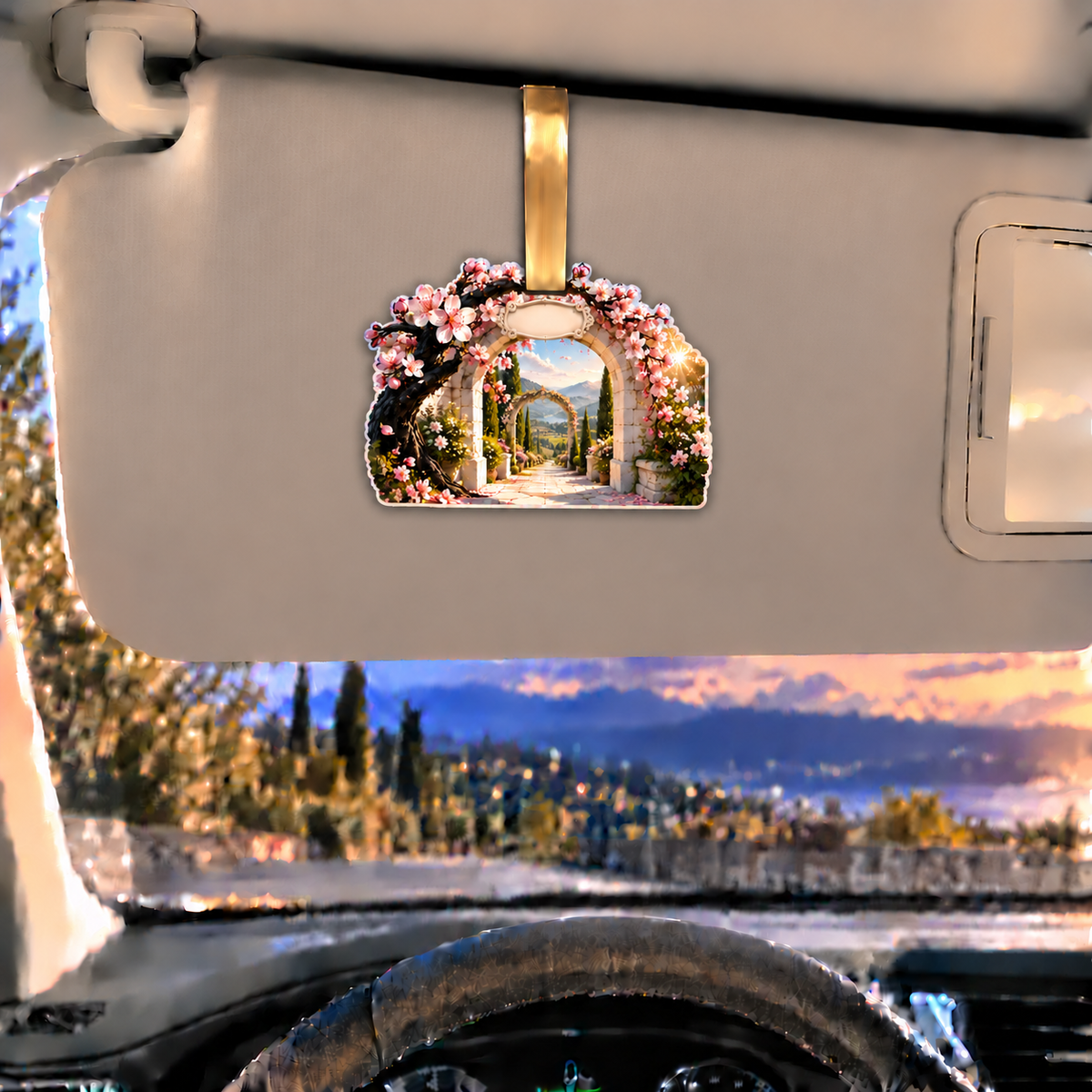 Cherry Blossom Welcome Arch Holographic Car Visor Clip with printed optical 3D artwork in its use setting
