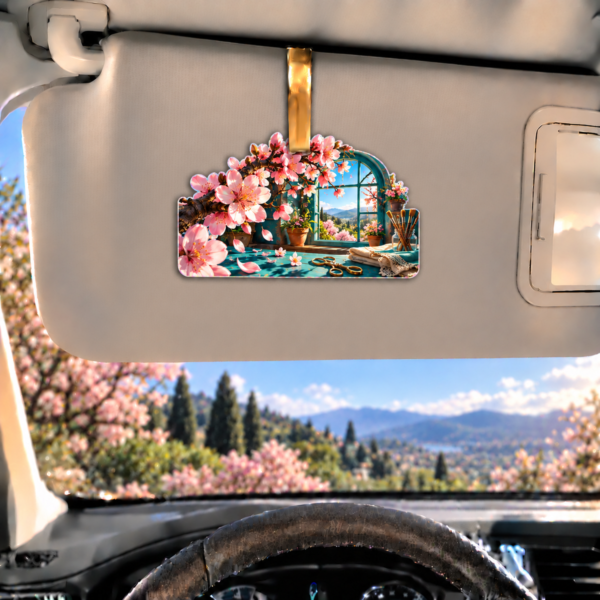 Sakura Atelier Window Holographic Car Visor Clip with printed optical 3D artwork in its use setting
