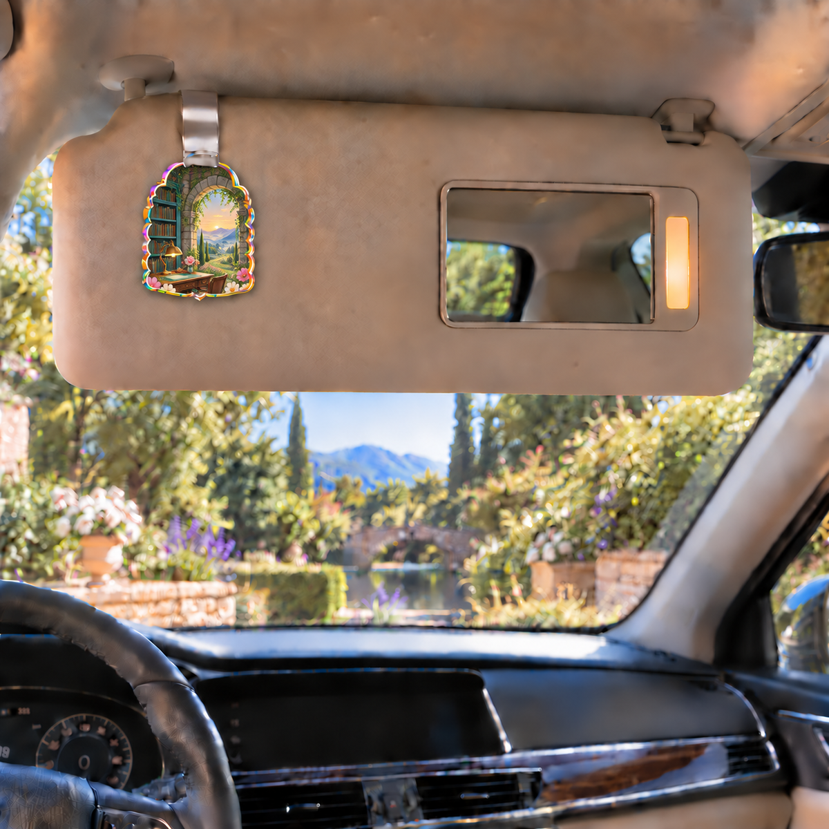 Cosmos Writing Retreat Holographic Car Visor Clip with flat printed cosmos writing retreat artwork in a complete use setting